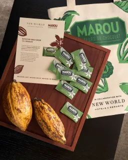 Savour the essence of local craft

A co-branded creation by New World Hotels & Resorts and Marou Chocolate, the Napolitain Single Origin 72% chocolate square embodies dedicated bean-to-bar craftsmanship. Made from distinctive cacao grown in Vietnam, it preserves a rich, robust, and authentic flavour profile.

Thoughtfully prepared as a light in-room amenity, this intentional gesture is designed to accompany your stay and enrich your experience at New World Saigon Hotel.

Join us to explore and experience this unique flavour journey during your stay.

@marouchocolate
@newworldhotels
@newworldphuquocresort
@newworldsaigon
@newworldhoianabeachresort
#MarouXNewWorldHotels
#NewWorldHotels
#BeyondtheSummer